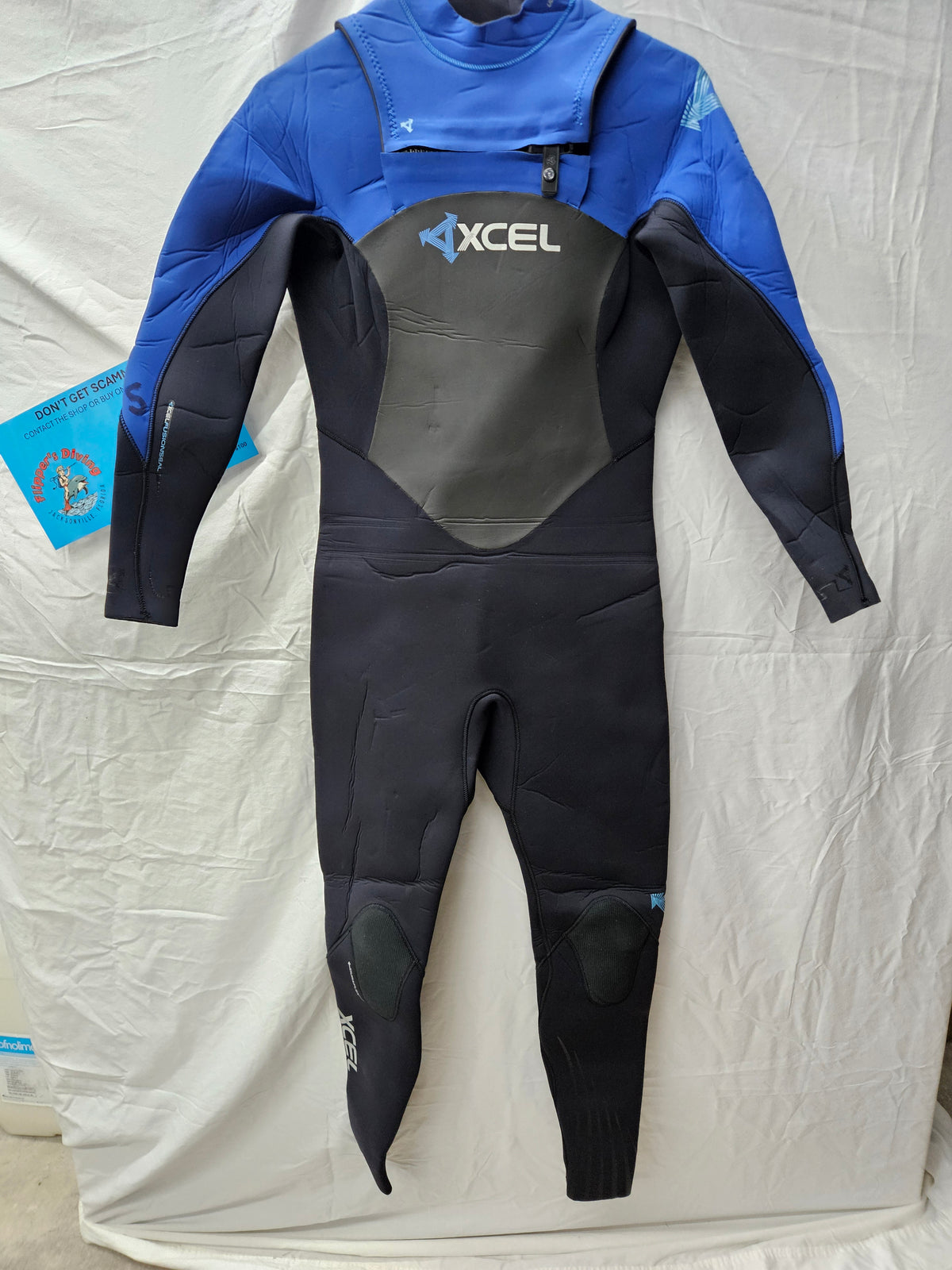 Xcel "infinity x-zip" 4/3mm Wetsuit (SMALL)