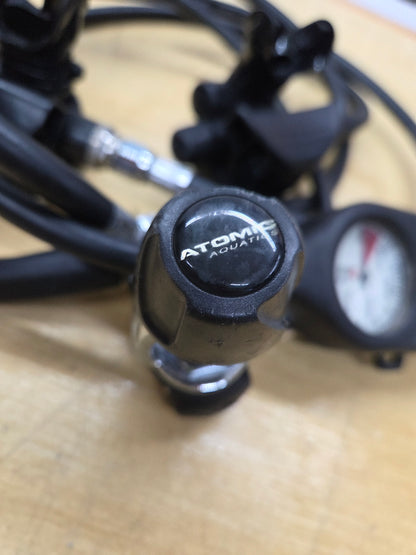 Atomic Z2 Regulators